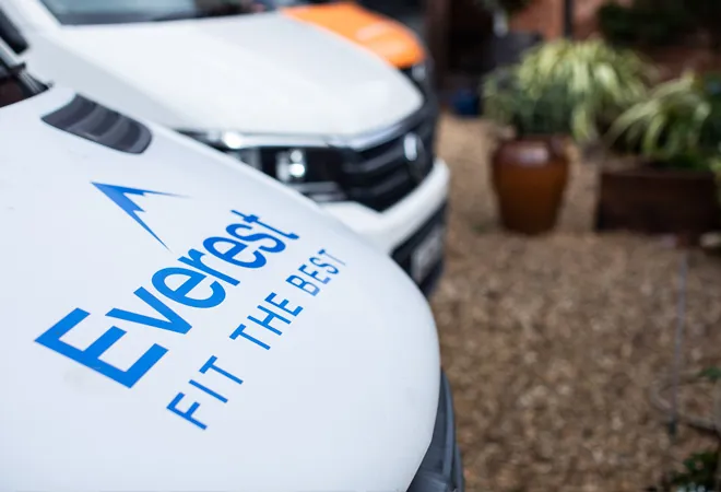 Everest logo on a white van hood