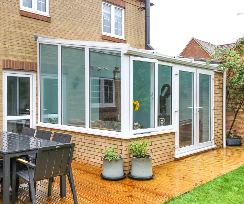 White Everest conservatory with glass windows and doors