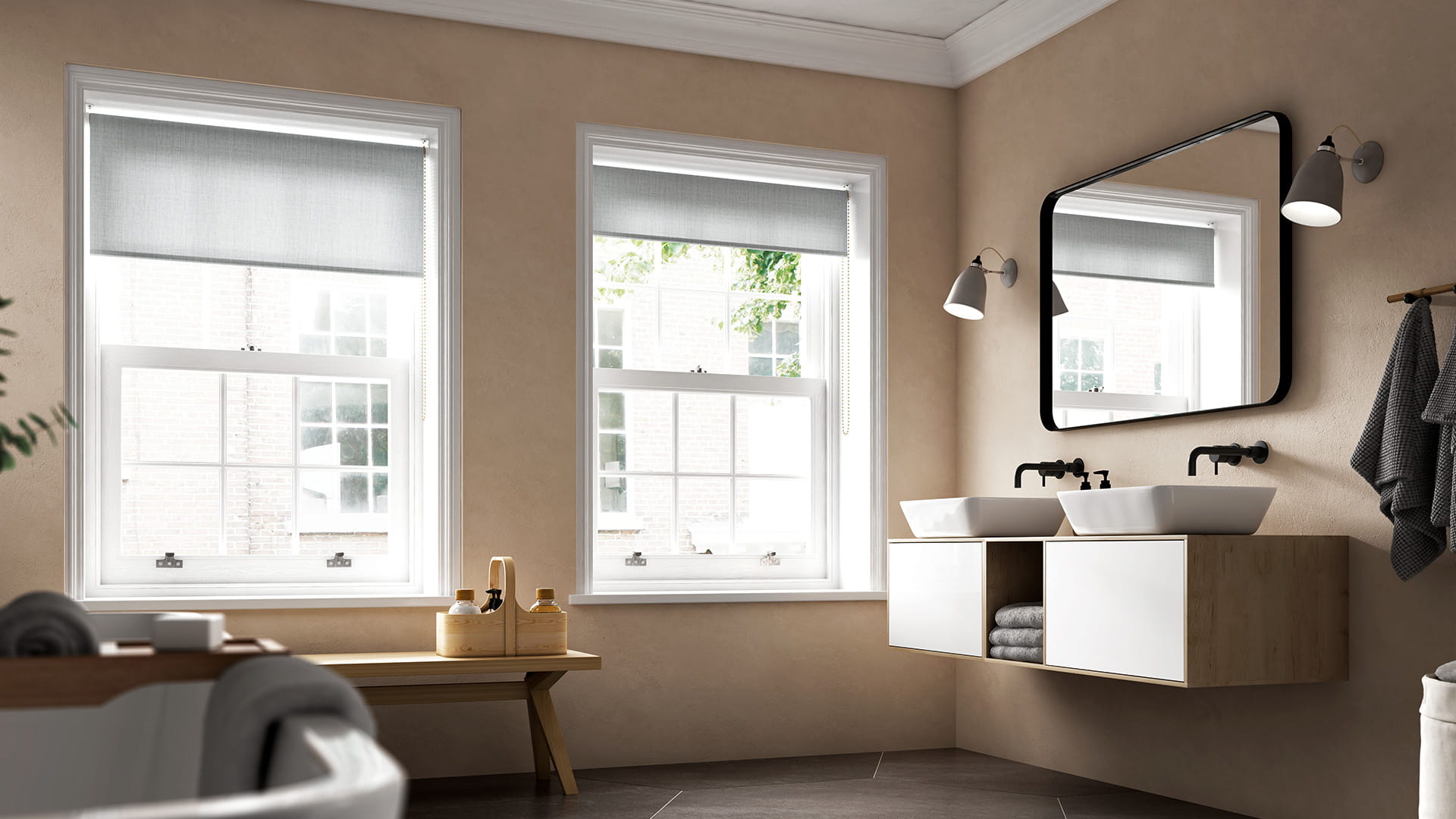 Beige bathroom with two windows and a vanity unit