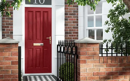 Red door with brick exterior