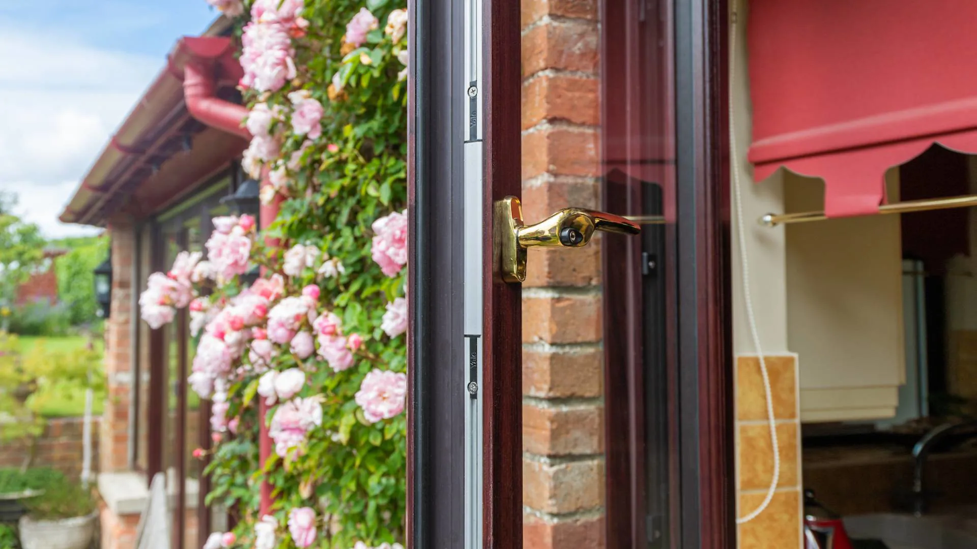 Everest conservatory window with bronze handle