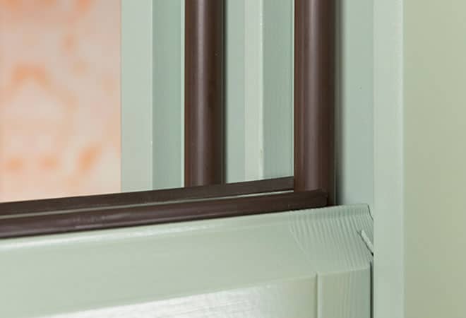 Everest conservatory window frame detail with dark brown seals