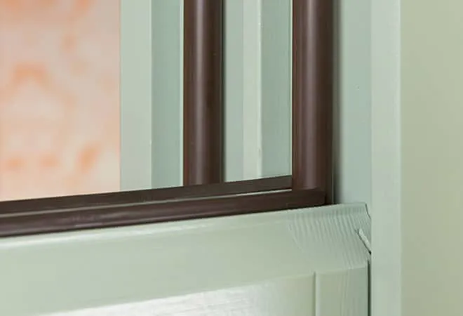 Everest conservatory window frame detail with dark brown seals