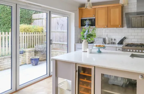 Everest conservatory kitchen with light grey countertops
