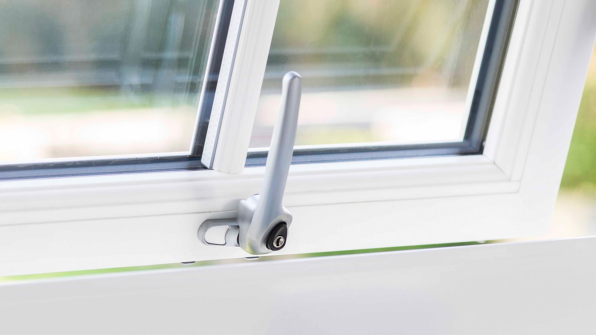 White window with silver handle