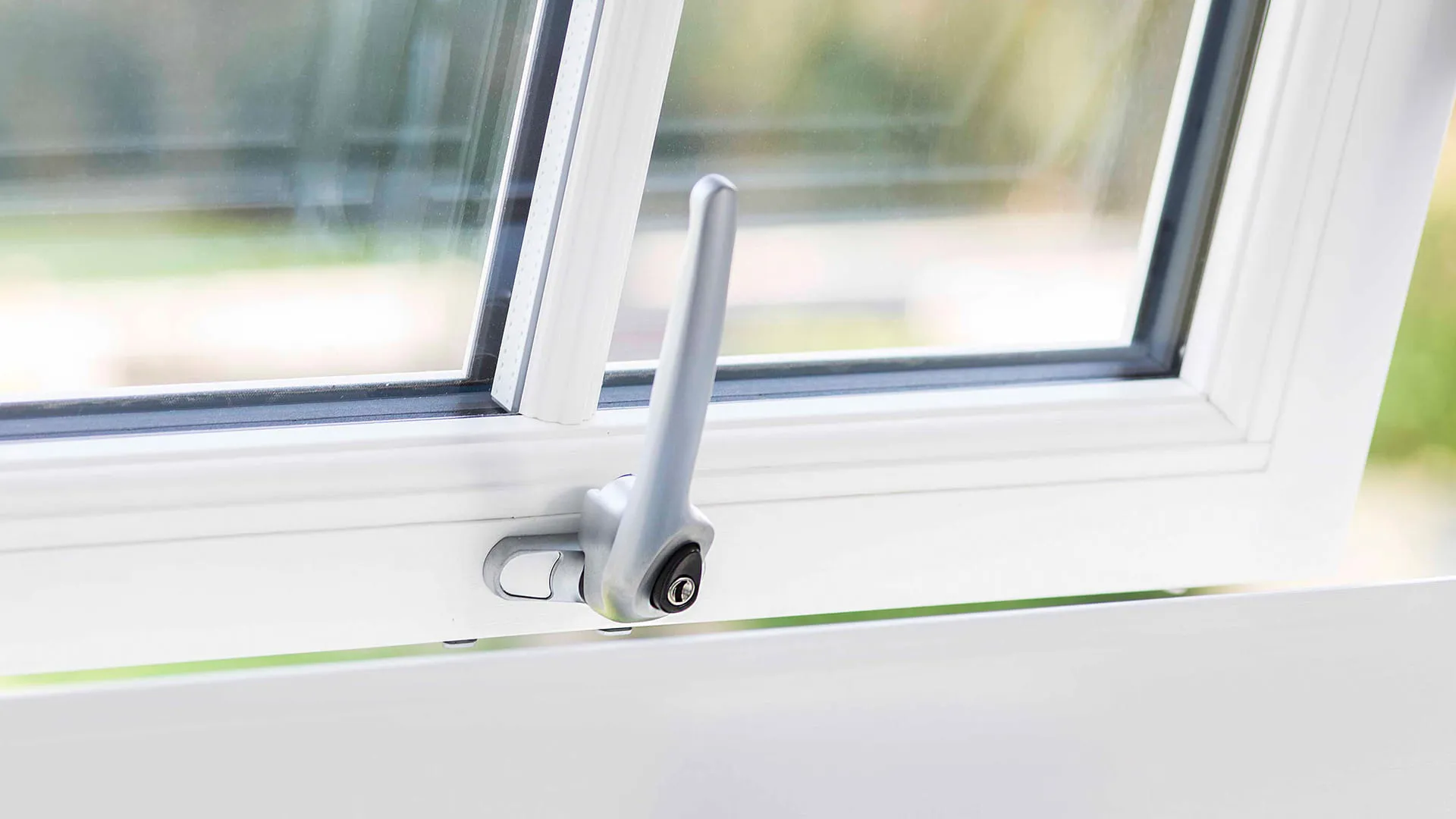 White window with silver handle