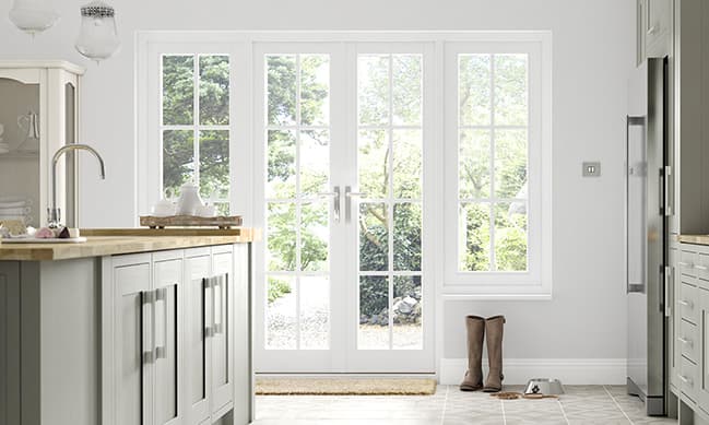 White Everest conservatory doors with garden view
