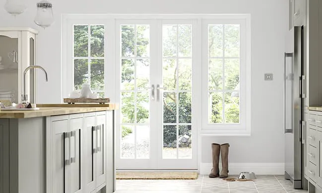 White Everest conservatory doors with garden view