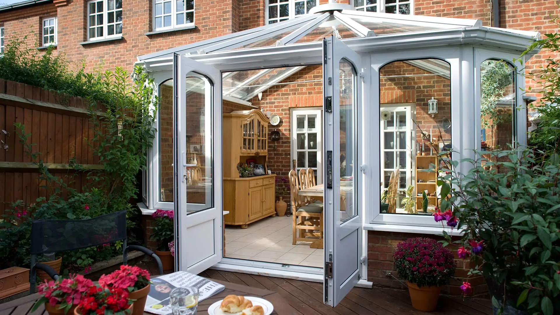 White Everest conservatory with open doors