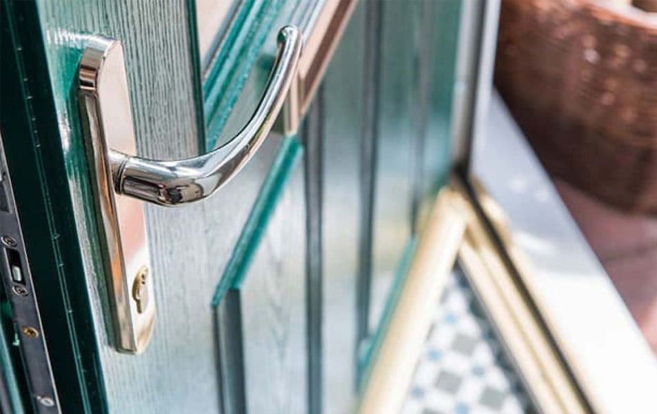 Everest conservatory door with teal colored glass and silver handle