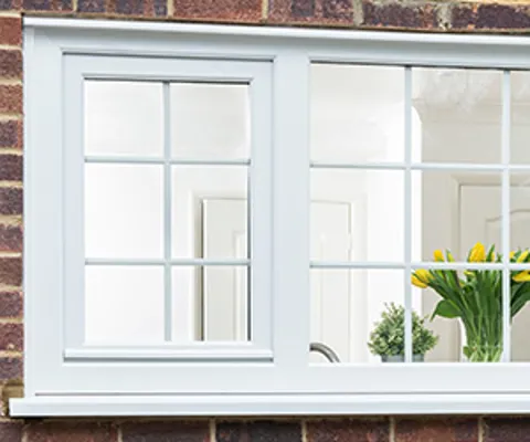 White Everest conservatory window with divided panes