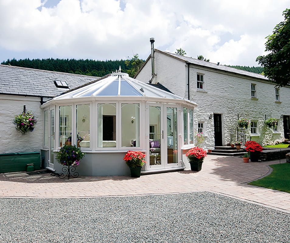 White Everest conservatory with windows and plants
