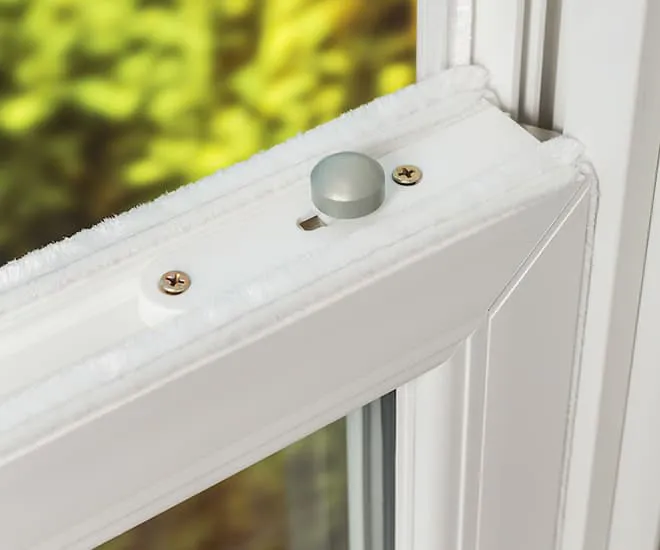 Everest conservatory white window detail with white wiper and grey button