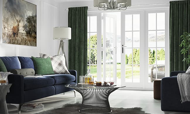 Everest conservatory with dark green curtains and white doors