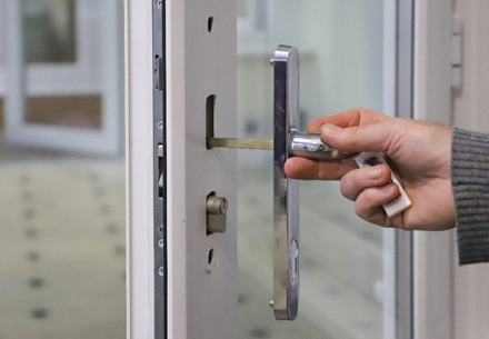 Person opening Everest conservatory door handle