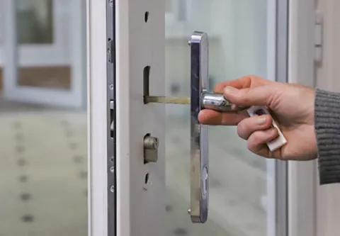 Person opening Everest conservatory door handle
