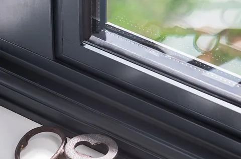 Closeup of dark grey Everest conservatory window frame