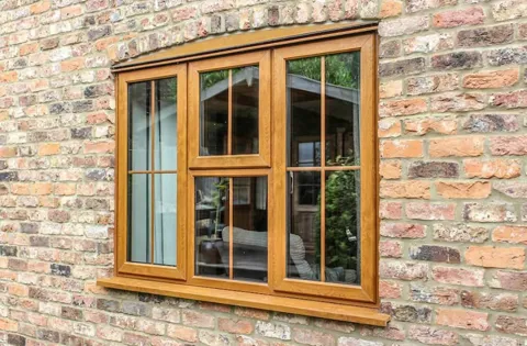 Everest conservatory window with light brown timber frame