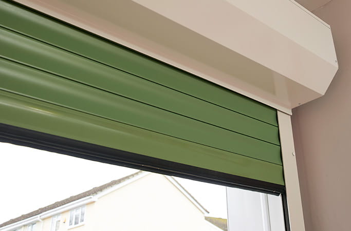 Green metal Everest conservatory shutter