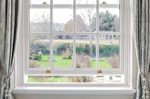 White Everest conservatory window with garden view