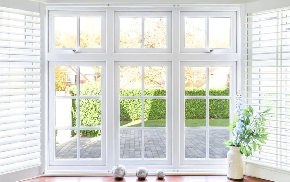 White Everest conservatory windows with garden view