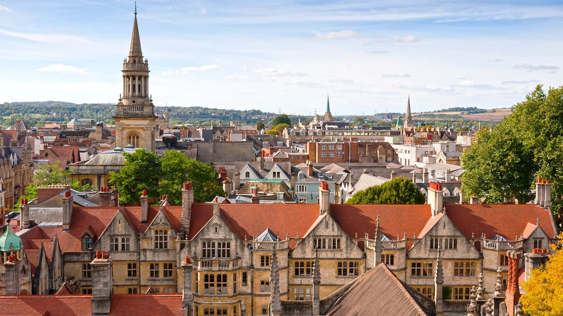 Cityscape view of historic buildings with red roofs