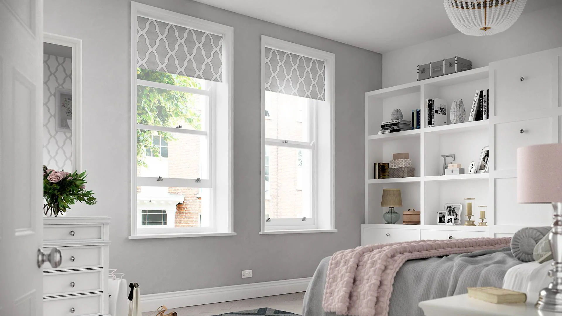 Grey patterned roller blinds in a light gray bedroom