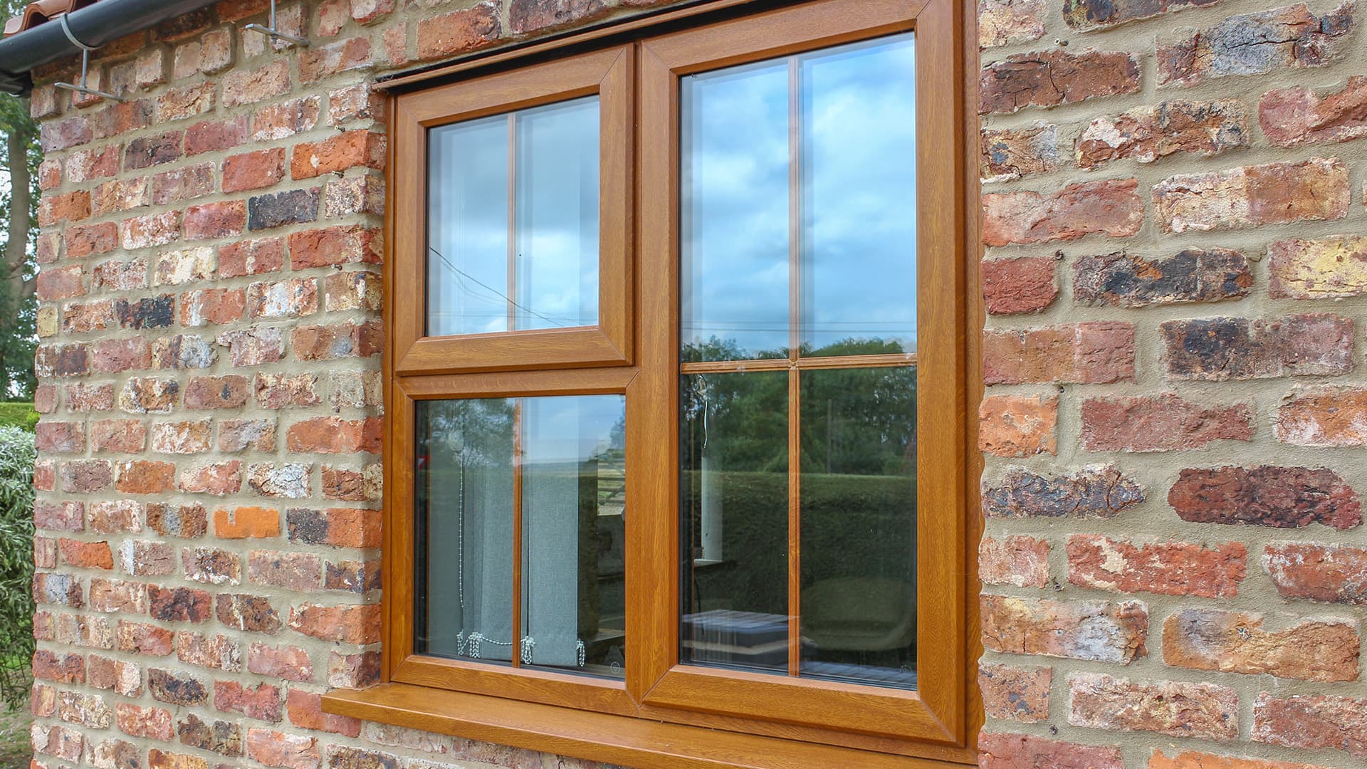 Wooden window on brick wall