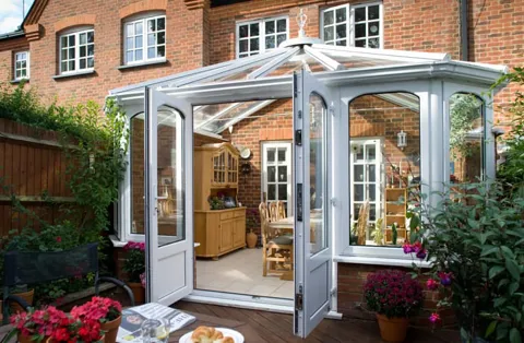 White Everest conservatory with open doors