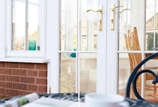 Everest conservatory white double doors with gold handles